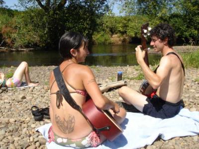 Charmaine Slaven and Charlie Beck enjoy some tunes down by the river.  110.jpg