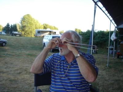 John Bogert looking for a hidden picture in Joe Fulton's bow.  348.jpg