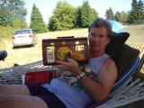 Charlie in the hammock showing off nice train case 422.jpg