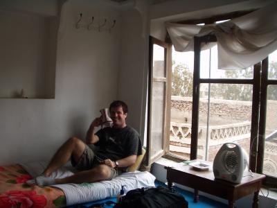 Pretending to drink coffee in my room in Sana'a