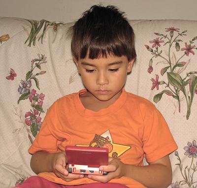 Playing Gameboy SP