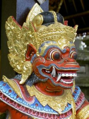 Wood carved 'Arjuna' door guardian figure at Gunung Kawi