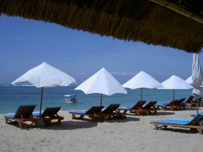 Blue sky and clear sea water of Geger Beach at Nusa Dua