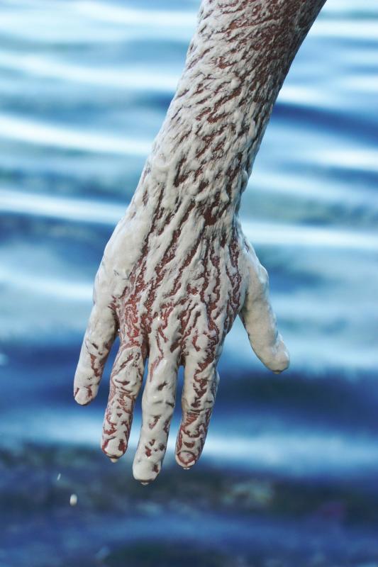 Lending a hand... of sand