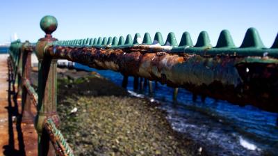 rusty railing at boston harbor