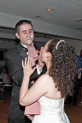 Sharing the cake with the bride