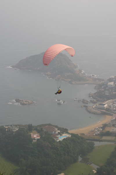 Pink Paraglider over Ng Fan Chau
