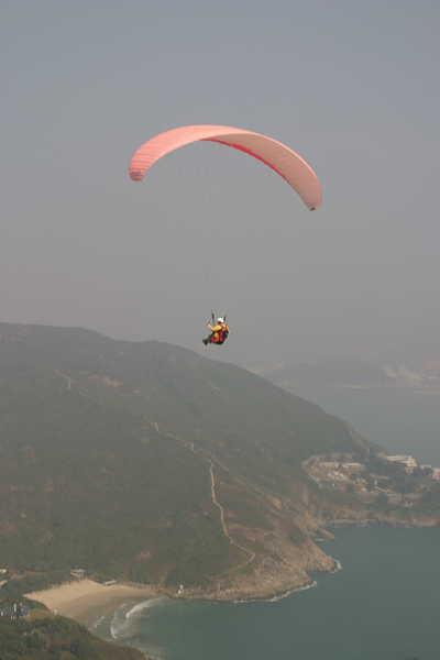 Pink Paraglider over Big Wave Bay