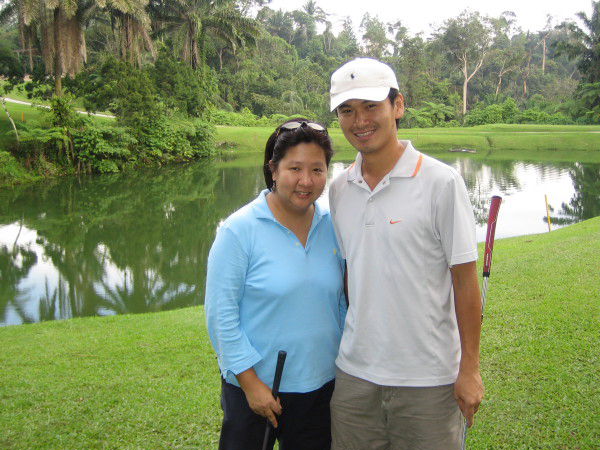 Noon and Khanh at the water hazard