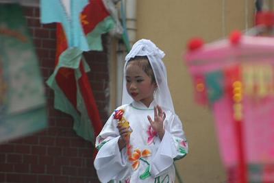 Child Dressed as Budda (Closer)