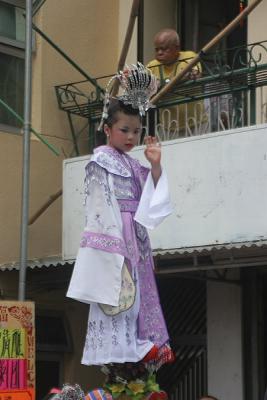 Child Dressed in Purple Traditional Dress