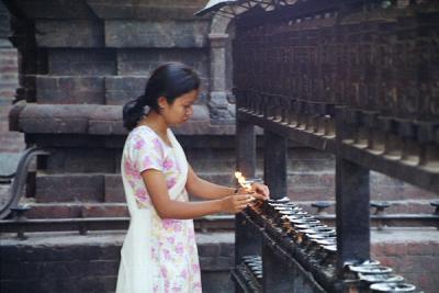 Woman Lighting Candles (Close Up)