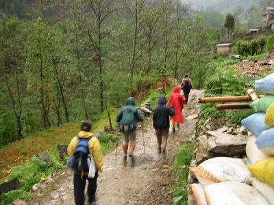 Areeya, Orakarn, Fair, Ornprapid, and Guide Continuing in the Rain