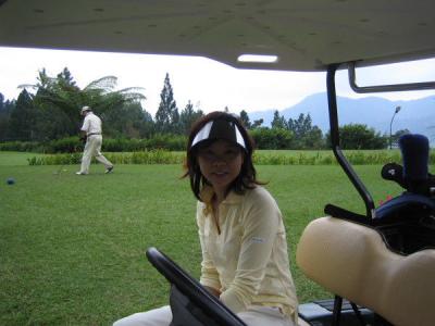 Joyce in golf cart