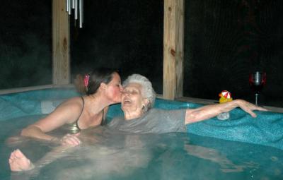 R kissing grandma in our hot tub  04.jpg