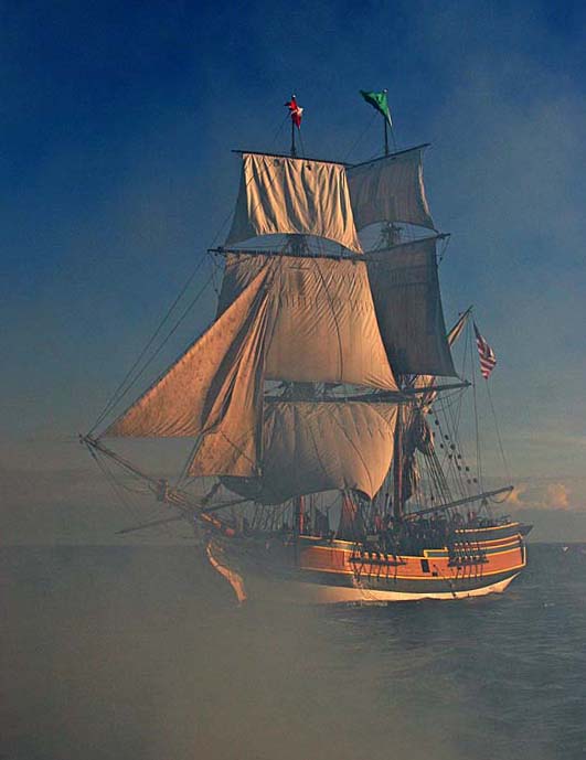 <b>4th Place</b><br><i>Tall ships, mock gun battle</i><br>by Gary Woodburn