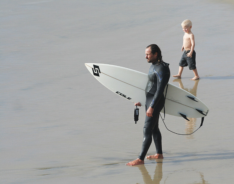 Man & Boy Hesitate, Contemplating The Same Rough Sea * Traveller