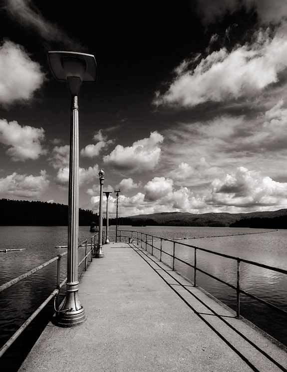 Puffs of clouds over the reservoir