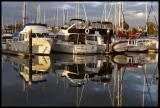 Between Reality and Reflection (*)