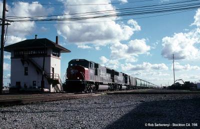 Two Southern Pacific SD70Ms crossing the Santa Fe at Stockton Tower