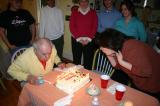 Dad and  Rose blow out the candles