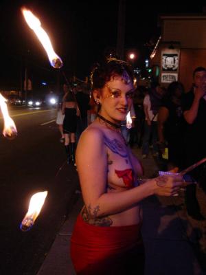DSC00445.jpg Amee White with Shiva style burning fire body peircing on South tryon Street bring the freak into the street at Am