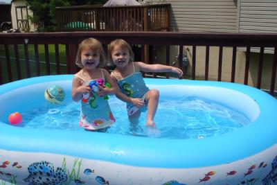 Summer fun in the pool (Reagan on left)