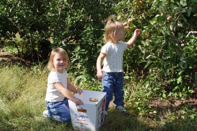 Off to pick apples!  Reagan on the left