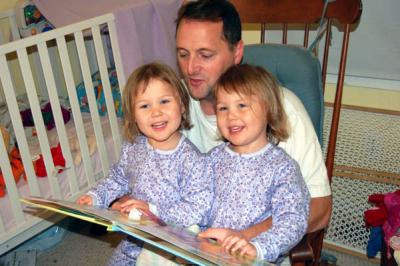 Bed time story with Daddy (Rory on the left)