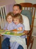 Bed time story with Daddy (Rory on the left)