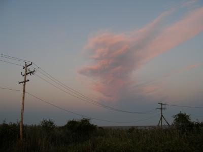 Pink Vertical Cloud over Power Lines