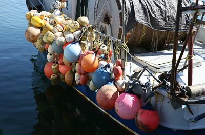 Floats Hanging On The Side Of A Fishing Boat