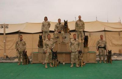 SSgt. Jon  Sarabia & Amor, 2nd from left, standing.  SRA Michael Priessman, top row center & Chico