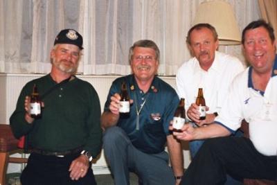 Mike Potter (Ubon), Mike Monger, Bernie Turnbloom, & Bill Cummings enjoying a Singha.