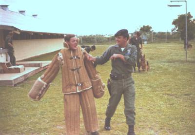 Gene Walsh is the handler in attack Suit.  SSgt Louis Saffold next to him.