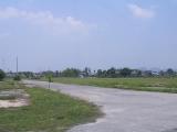 Road into the former hootch area located near the main gate and south of the USO.