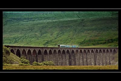 A train crosses the Ribblehead Viaduct, Yorkshire Dales