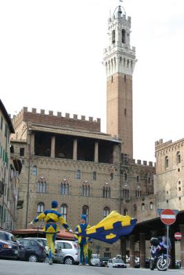 Contrada Tartuca rehearsing for the Palio behind the town hall