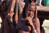 Himba woman with a lolly, Nambia (Andrea Rasetti)