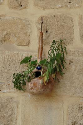 Wall gourd with evil eye