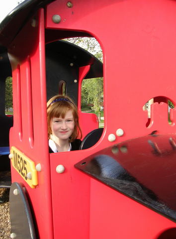 Red head engineer in the red train