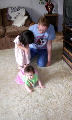 Trying to crawl at seven months