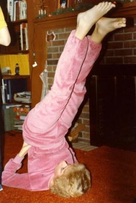 Demo of the very difficult shoulder stand (Don't try this at home, kids)