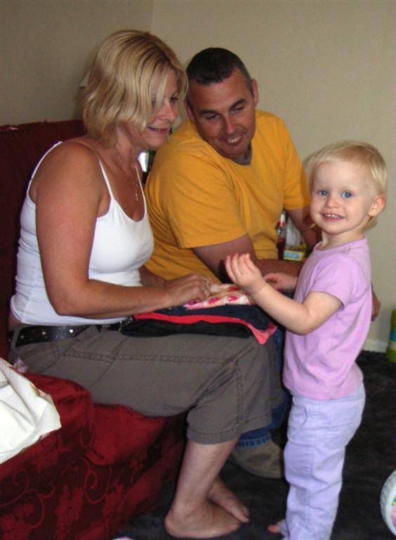 Helping Nan with her birthday present opening. Sunday 7th August 2005