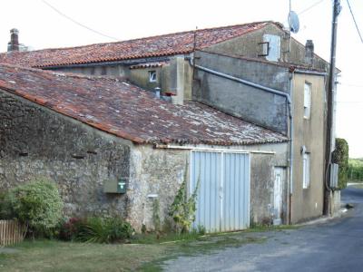 House  and rear buildings from road