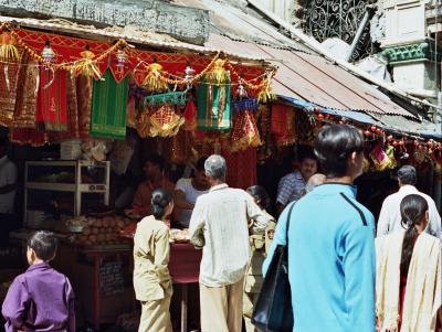 Policewoman (centre left) looking at stall