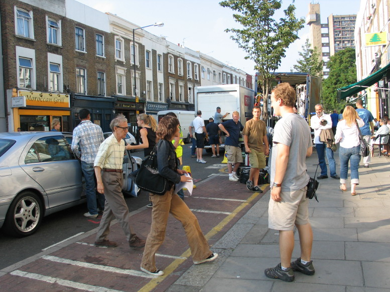 Woody arrives with his assistant