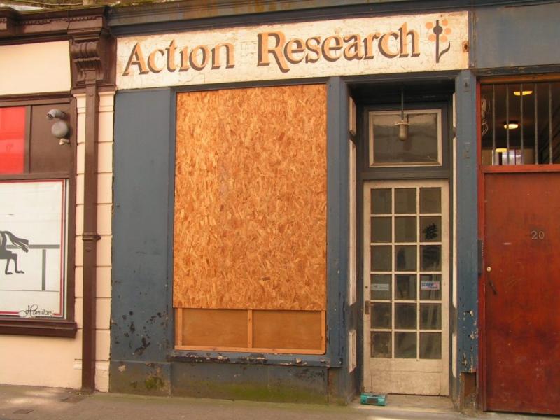 boarded up shop