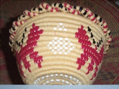 Salish Basket. Imbricated Butterfly decoration with white beading.