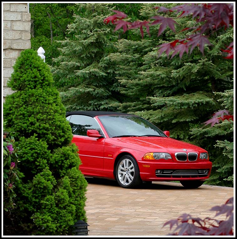 A BMW Revealed On A Stone Pavement